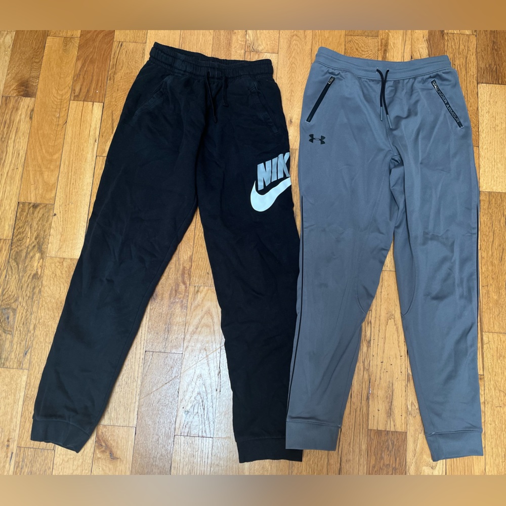 Set of 2 boys sweatpants. Nike youth XL. Under Armour XL.